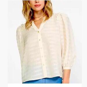 CURRENT AIR 
Ruffled Shoulder Top In Cream